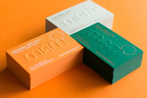 Business Cards — business card #1088 Colourful embossed business cards for professional branding.