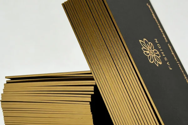 Business Cards — business card #1091 Luxury business cards with gold edges and floral logo design.