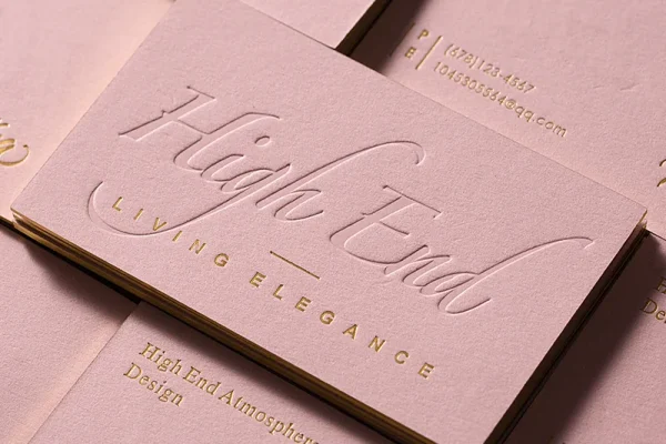 Business Cards — embossed business card #1206 Luxury embossed business card with foil accents for high-end branding.