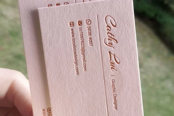 Business Cards — embossed business card #1209 Embossed business card with custom logo and contact details.