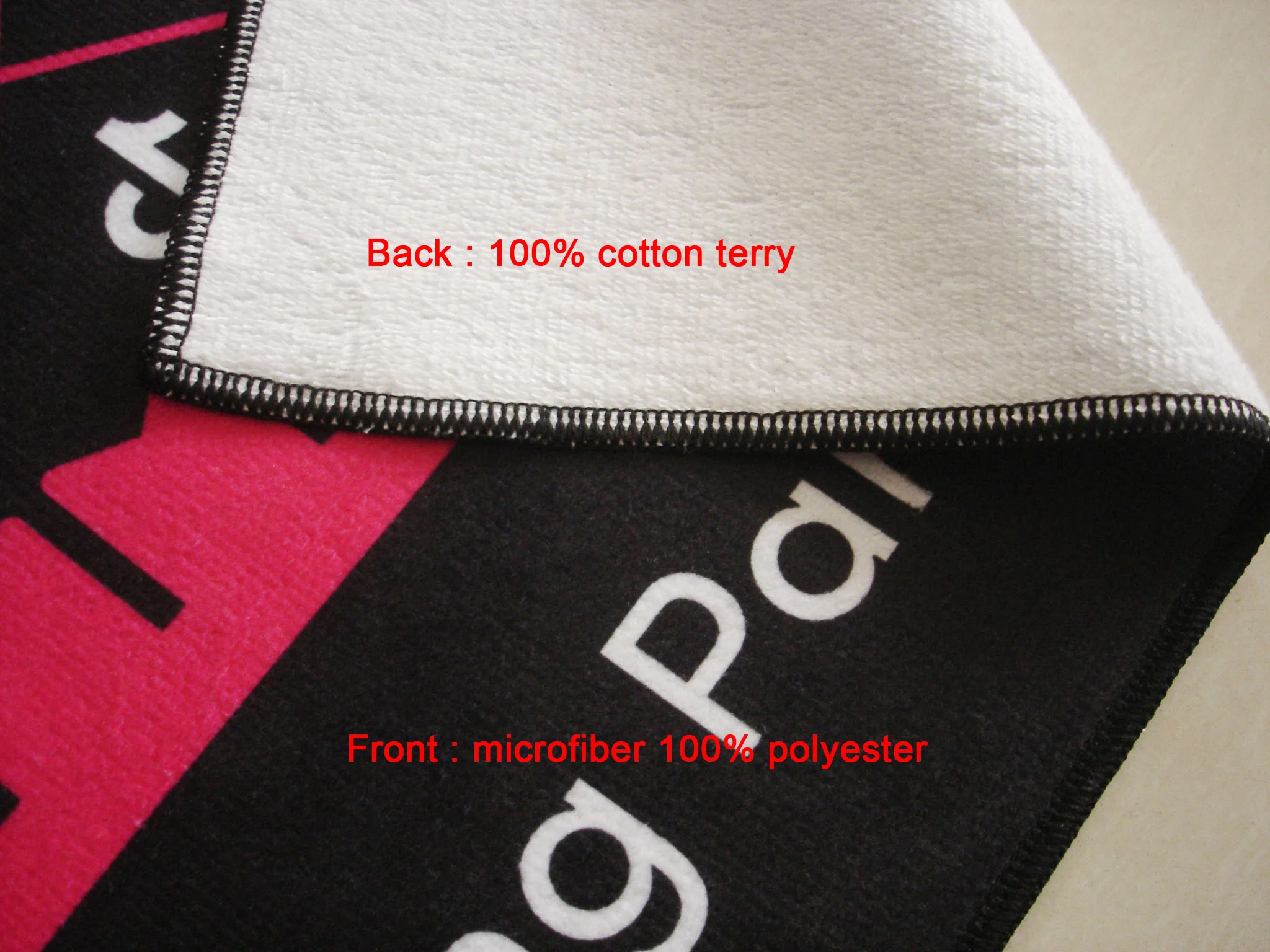 Custom microfiber towel with cotton terry back for printing services.