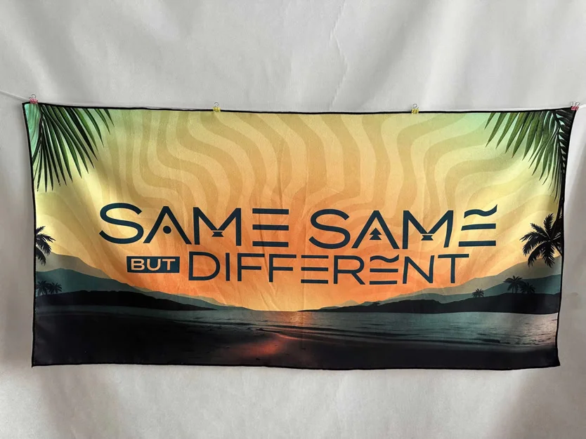 Canvas banner with 'Same Same But Different' design for promotional use.