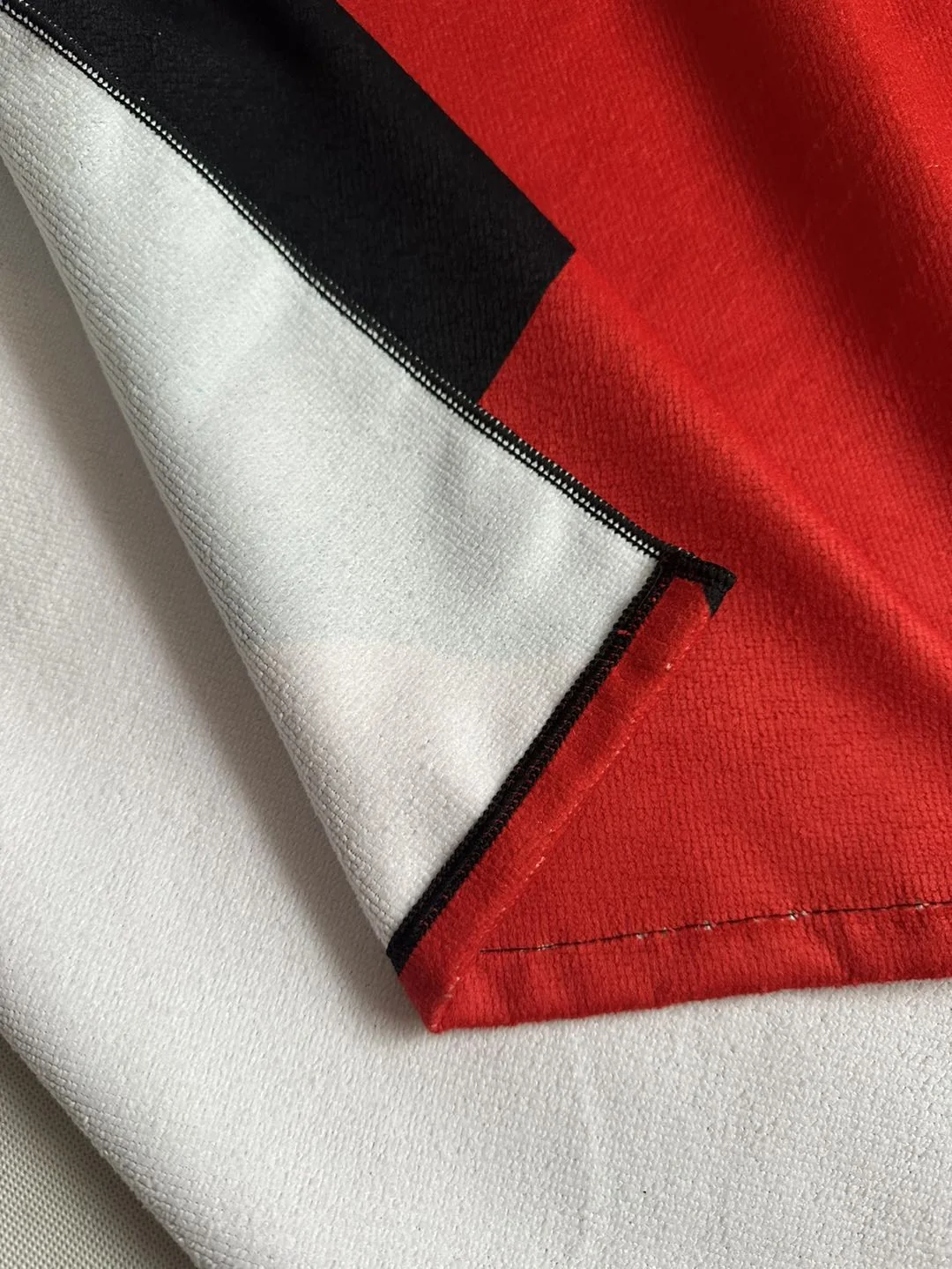 Close-up of printed fabric showcasing garment printing service.