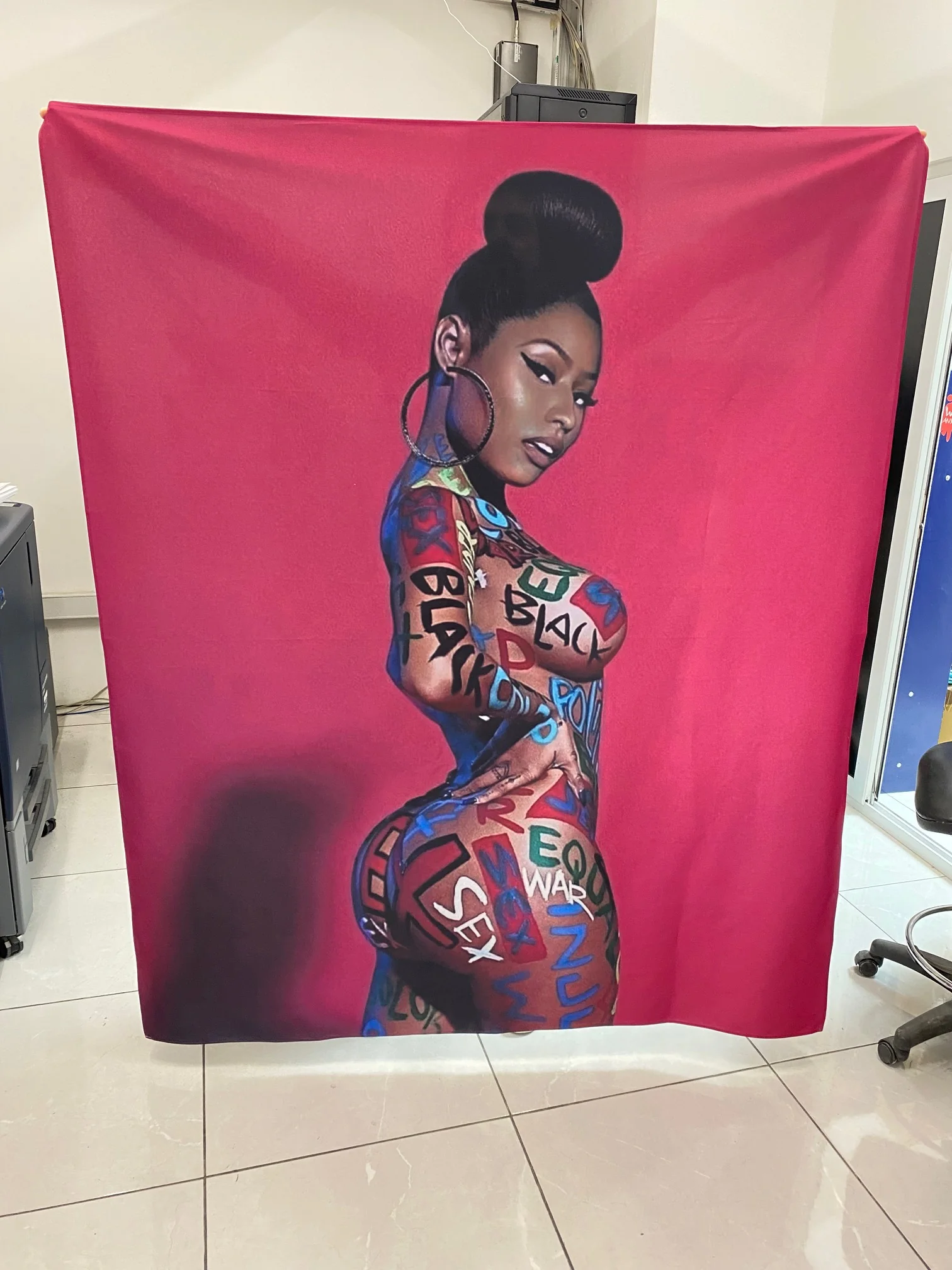 Custom printed towel with stylized image and graffiti text.