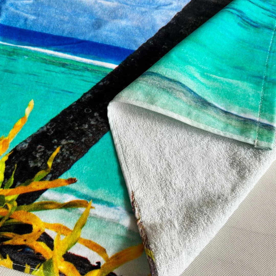 Custom printed towel with a beach scene, showcasing custom towel printing services.