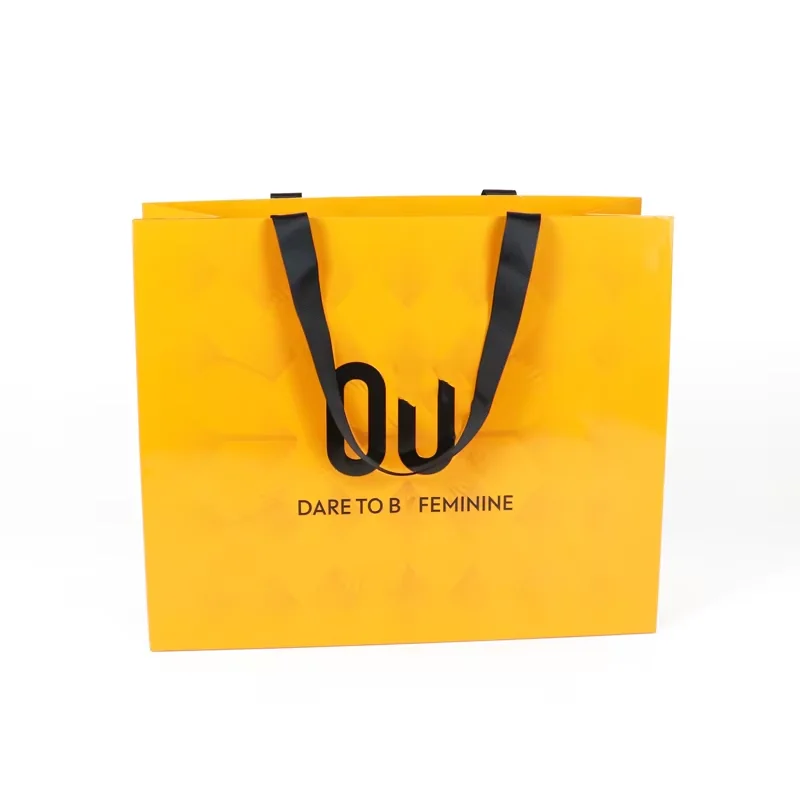 Branded paper shopping bag - retail packaging Malta